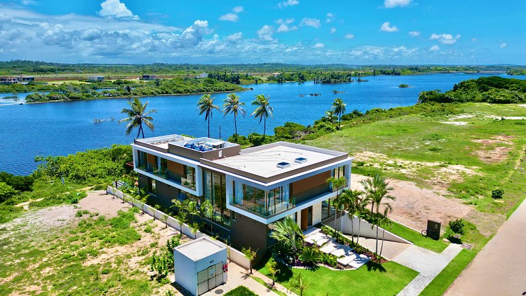 Mansão Alphaville Guarajuba|Casa do Lago Frente Mar e Lagoa