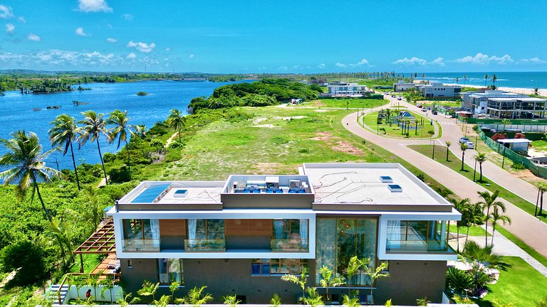 Mansão Alphaville Guarajuba|Casa do Lago Frente Mar e Lagoa