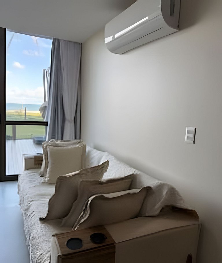 Apartamento Pé na Areia em Guarajuba Frente Mar NAIA 07